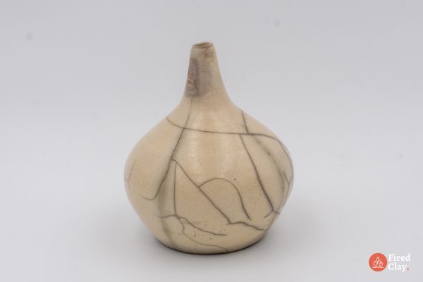 a small raku single stem vase, white/off white with complex crackles glaze patterns