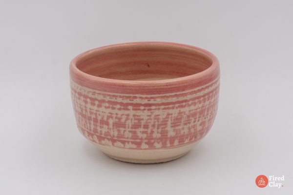 Ruby coloured stoneware bow with chattering texture