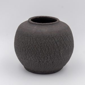 Small black unglazed bowl/jar.