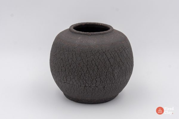 Small black unglazed bowl/jar.