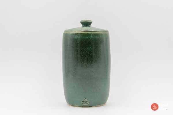 Stoneware lidded jar in jade green glaze